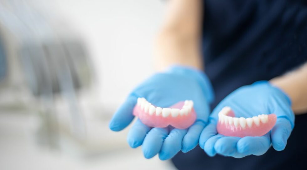 What’s the Difference Between a Bridge and Dentures? Corona Family Dental